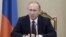 FILE - Russian President Vladimir Putin chairs a meeting with members of the Security Council at the Kremlin in Moscow, Russia, Jan. 22, 2016. Seventy-four percent of Russians would vote to re-elect Putin as president, according to a poll by VTsIOM.