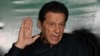 FILE - Former Pakistani Prime Minister Imran Khan speaks to media representatives at his residence in Lahore on May 18, 2023. U.N. experts on July 1, 2024, demanded the release from detention of Khan, who was convicted on corruption charges in August 2023.