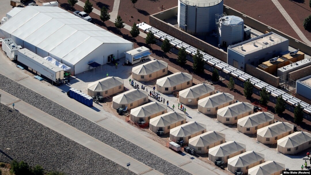 A tent-city compound housing immigrant children is seen next to the Mexican border in Tornillo, Texas, June 18, 2018. The Navy has drafted a memo containing plans for detention centers for adult illegal migrants on military bases, if needed. 