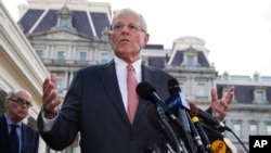 FILE - Peruvian President Pedro Pablo Kuczynski speaks to reporters in Washington, Feb. 24, 2017. 