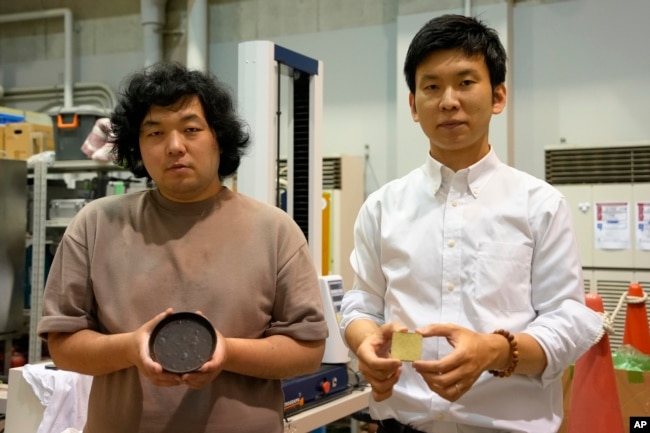 Sakai and Machida developed a technology that can transform food waste into "cement" for construction use. (AP Photo/Chisato Tanaka)