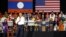 Participants listen as U.S. President Barack Obama holds a town hall-style meeting with a group of Young Southeast Asian Leaders Initiative (YSEALI) attendees, alongside his participation in the ASEAN Summit, at Souphanouvong University in Luang Prabang, 