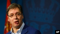 Serbian Prime Minister Aleksandar Vucic speaks during a press conference, in Belgrade, Serbia, Oct. 30, 2016. Vucic and his family were moved to a safe location after a cache of weapons was found Saturday near his residence outside Belgrade.