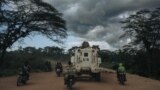 (FILE) A UN vehicle drives along a road, in Beni territory, North Kivu province, eastern Democratic Republic of Congo, on May 9, 2024. 