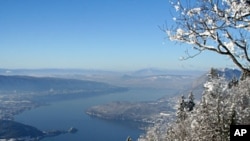 Photo provided by Annecy Tourism Office shows Annecy and its lake, French Alp (File)