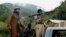FILE - Pakistani Taliban patrol in Shawal, in the Pakistani tribal region of South Waziristan, Aug. 5, 2012. 