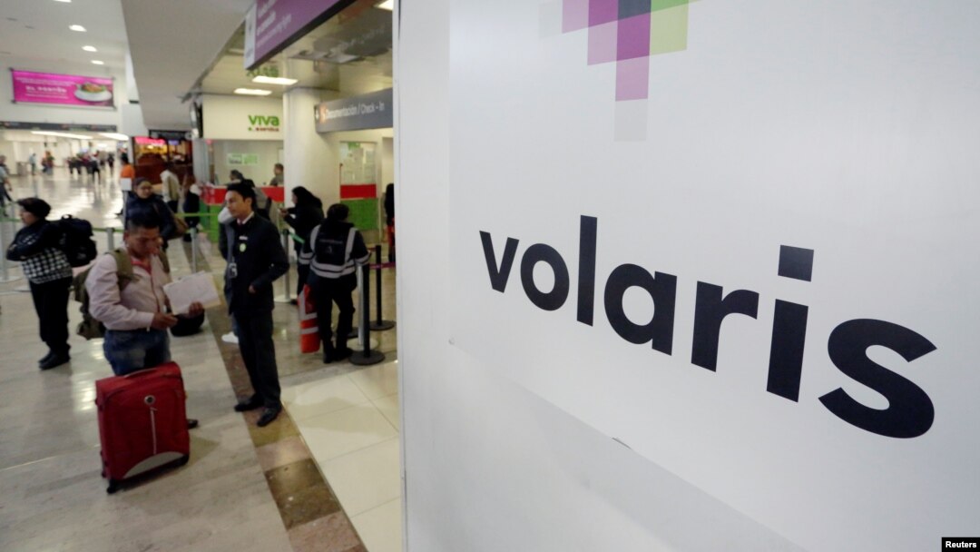 The logo of Mexican low-cost air carrier Volaris at Benito Juarez International Airport in Mexico City, Jan. 10, 2018. The airline is offering free flights to reunite families separated by President Trump's zero tolerance immigration policy.