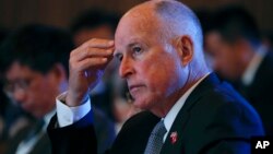 California Gov. Jerry Brown attends the Clean Energy Ministerial International Forum on Electric Vehicle Pilot Cities and Industrial Development, at a hotel in Beijing, June 6, 2017. 