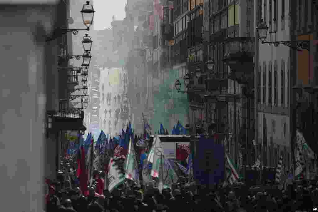 Workers of the automotive sector march during a demonstration in Rome on the occasion of their national strike.