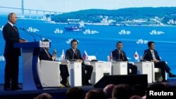  Russian President Vladimir Putin delivers a speech during a session of the Eastern Economic Forum in Vladivostok, Russia, Sept. 7, 2017.