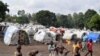 FILE - Victims of ethnic violence are seen at a makeshift camp for the internally displaced people in Bunia, Ituri province in the eastern Democratic Republic of Congo, June 25, 2019. 
