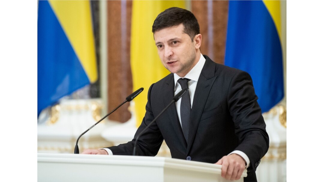 FILE - Ukrainian President Volodymyr Zelenskiy speaks in Kyiv, Dec. 4, 2019.