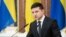 FILE - Ukrainian President Volodymyr Zelenskiy speaks in Kyiv, Dec. 4, 2019.