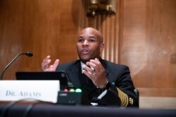 Surgeon General Jerome Adams appears before a Senate Health, Education, Labor and Pensions Committee hearing to discuss vaccines and protecting public health during the coronavirus pandemic on Capitol Hill, Sept. 9, 2020.