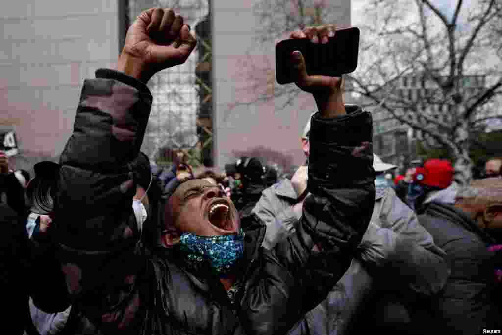 A person reacts after the verdict in the trial of former Minneapolis police officer Derek Chauvin, found guilty of the death of George Floyd, in front of Hennepin County Government Center, in Minneapolis, Minnesota, April 20, 2021.