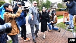 Huawei chief financial officer Meng Wanzhou leaves her Vancouver home with her security detail for an extradition hearing in British Columbia Supreme Court, on January 21, 2020 in Vancouver, British Colombia. - The Chinese telecommunications…