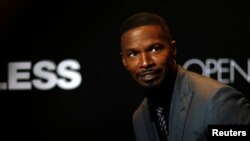 FILE - Jamie Foxx poses at the premiere of the movie "Sleepless" in Los Angeles, California, Jan. 5, 2017. 