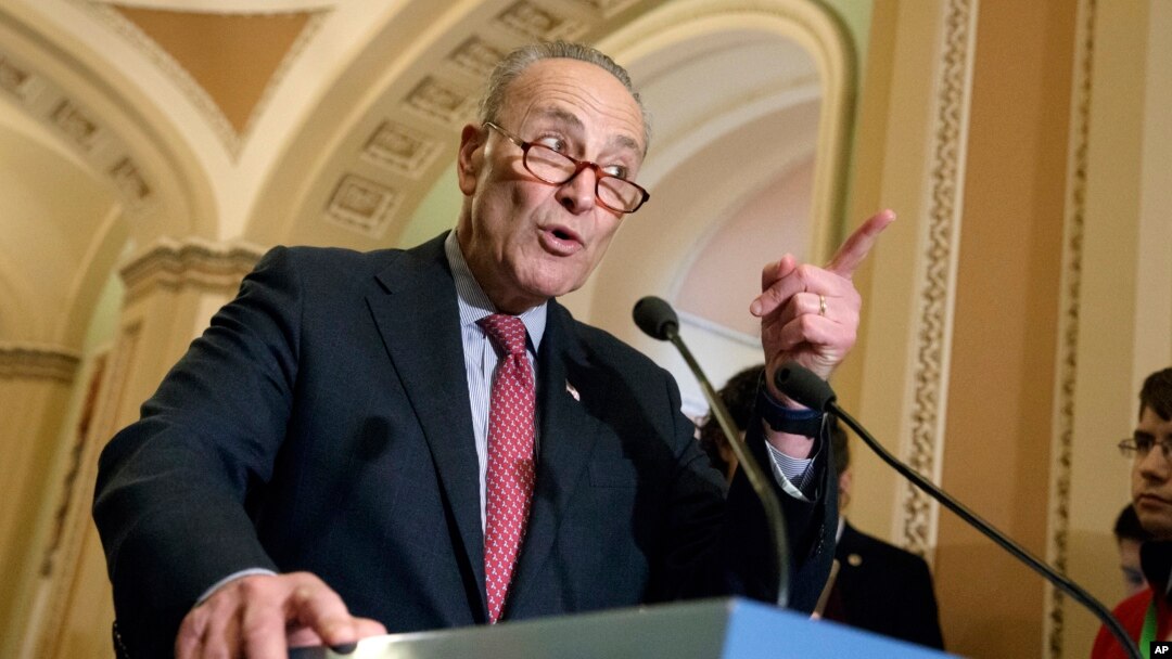 FILE - Senate Minority Leader Chuck Schumer, D-N.Y., speaks with reporters at the Capitol in Washington, March, 14, 2017. 