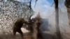 A Russian soldier fires from a howitzer in the Russian-Ukrainian border area in ​​the Kursk region, Russia, Oct. 28, 2024, in this photo taken from video released by the Russian Defense Ministry. The Pentagon says some North Korean troops are currently in the area.