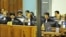 "Brother Number Two" Nuon Chea (4th L) and former Khmer Rouge foreign minister Ieng Sary (2nd R) sit at the Extraordinary Chambers in the Courts of Cambodia (ECCC) on the outskirts of Phnom Penh June 29, 2011.