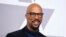 FILE - Common arrives at the 90th Academy Awards Nominees Luncheon in Beverly Hills, California, Feb. 5, 2018. Common showed up at P.S. 111 in midtown Manhattan on Thursday as an ambassador for the Adopt-A-Classroom initiative.