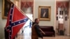 Man Seen Carrying Confederate Flag in US Capitol During Siege Arrested