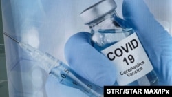 Photo by: STRF/STAR MAX/IPx 2021 8/25/21 J&J reports that a booster shot for tis vaccine after 6 months may have big benefits. 8/24/21 Here, a sign for a COVID-19 vaccine is seen in White Plains, New York.