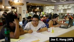 Students study in the Freudian Sip Cafe inside the newly-renovated Oviatt Library on the Cal State Northridge campus in Los Angeles.