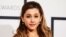 FILE - Singer Ariana Grande arrives at the 56th annual Grammy Awards in Los Angeles, California.