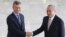 Argentine's President Mauricio Macri (L) is greeted by his Brazilian counterpart Michel Temer before their meeting at the Planalto Palace in Brasilia, Brazil, Feb. 7, 2017. 