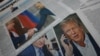 FILE - Daily newspapers with covers dedicated to the recent phone call of Russian President Vladimir Putin and U.S. President Donald Trump are laid out at a newsstand in a street in Moscow, Russia, Feb. 13, 2025. 