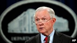 FILE - United States Attorney General Jeff Sessions speaks during a news conference at the Justice Department in Washington. 