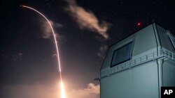 Photo provided by the U.S. Missile Defense Agency (MDA) shows the launch of the U.S. military's land-based Aegis missile defense testing system, that later intercepted an intermediate range ballistic missile, from the Pacific Missile Range Facility on the island of Kauai in Hawai
