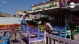 Meseros robots atraen visitantes a ciudad iraquí