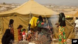 A displaced family at Al Mazrak camp in northern Yemen