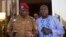 Lieutenant Colonel Yacouba Isaac Zida (L) meets with opposition leader Zephirin Diabre in Ouagadougou, capital of Burkina Faso, Nov. 2, 2014. 