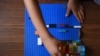 Sawyer Roellchen, 5, plays with Legos in his family's new home at Lackland Air Force Base in San Antonio, Texas, Nov. 16, 2019.