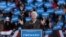 In the final hours of a four-state campaign day, President Barack Obama is introduced by former President Bill Clinton at a rally at Jiffy Lube Live arena, November 3, 2012, in Bristow, Virginia.