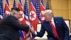 Ông Kim và ông Trump trong cuộc gặp hồi tháng Sáu năm nay.