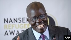 South Sudanese surgeon Evan Atar Adaha speaks during a press conference in the Kenyan capital Nairobi, Sept. 25, 2018, after being presented the UNHCR’s 2018 Nansen Refugee Award.