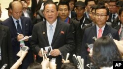 North Korean Foreign Minister Ri Yong Ho talks to reporters after a break during the 23rd Asean Regional meeting in Vientiane, Laos, July 26, 2016. 