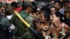 Troops, Vigilantes on Patrol After Venezuela Unrest Leaves 3 Dead