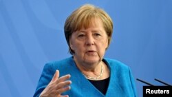 La canciller alemana, Angela Merkel, es una de las voces dentro de la Unión Europea que considera que el tratado comercial con China debe aprobarse.