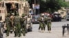 FILE - Kenyan police officers patrol as a part of a peacekeeping mission in Port-au-Prince, Haiti, July 17, 2024. 