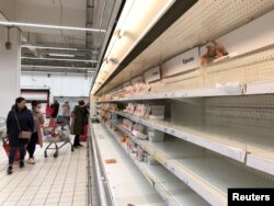 A view shows empty shelves in the meat department of a supermarket amid coronavirus concerns in Moscow, Russia, March 18, 2020.
