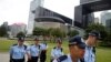 Police patrol outside the Legislative Council building in Hong Kong, June 11, 2019. 