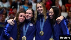 Swimming - Women's 4x100m Medley Relay Victory Ceremony