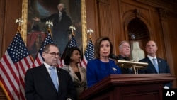 Democrats unveil articles of impeachment against President Donald Trump, abuse of power and obstruction of Congress, at the Capitol in Washington, Tuesday, Dec. 10, 2019.
