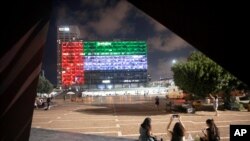 Tel Aviv City Hall is lit up with the flag of the United Arab Emirates as Israel and the UAE announced they would be establishing full diplomatic ties, in Tel Aviv, Israel, Aug. 13, 2020.