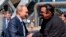 FILE: Russian President Vladimir Putin, left, and U.S. actor Steven Seagal shake hands after visiting an oceanarium built on Russky Island, where the Eastern Economic Forum takes place, in Russian Far Eastern port of Vladivostok, Russia. Taken Fri. Sept. 4, 2015